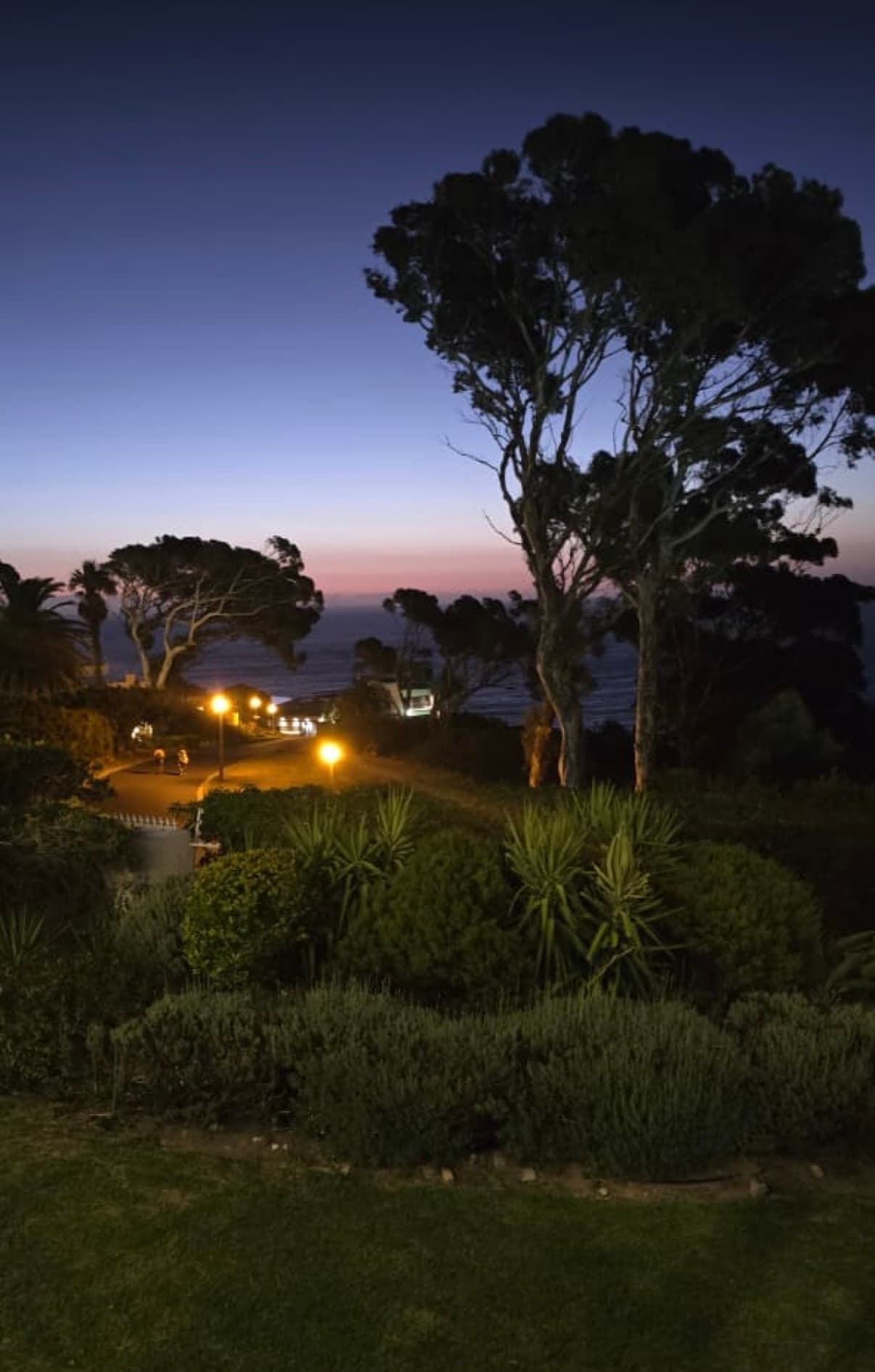 Sunset garden terrace overlooking coastline